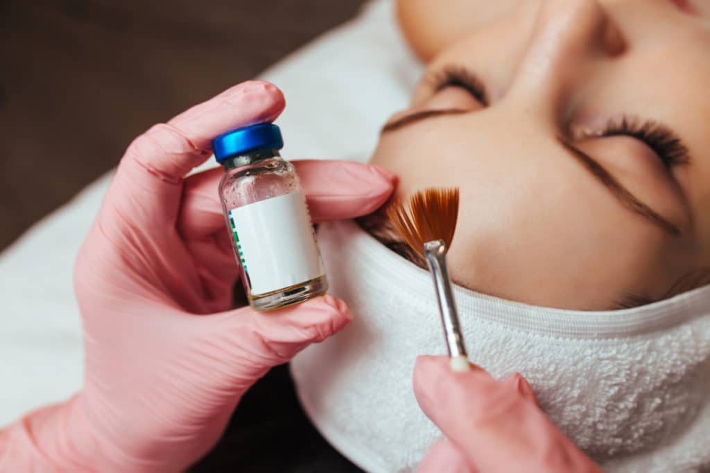 A woman getting a chemical peel.